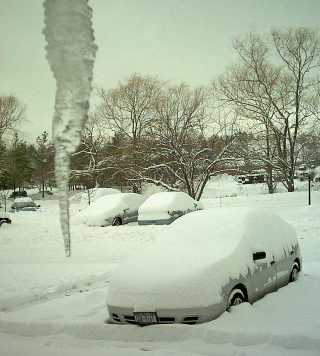 Snow with looming icicle